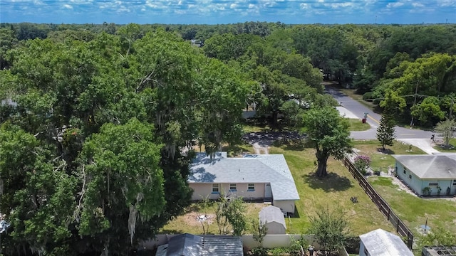 aerial view with a wooded view