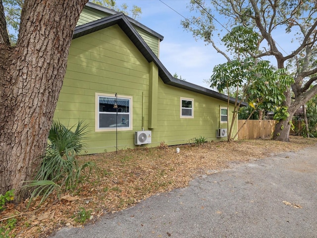 view of home's exterior with ac unit