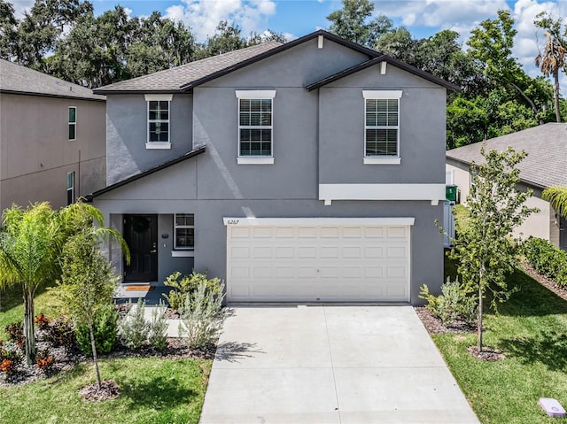 front of property featuring a garage