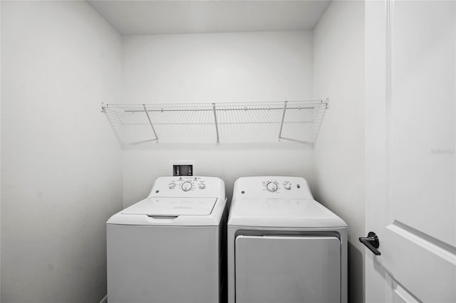 laundry area featuring independent washer and dryer