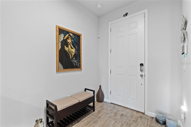 entryway with light hardwood / wood-style floors