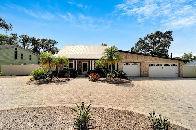 view of front of home featuring a garage