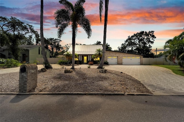 view of front of property featuring a garage