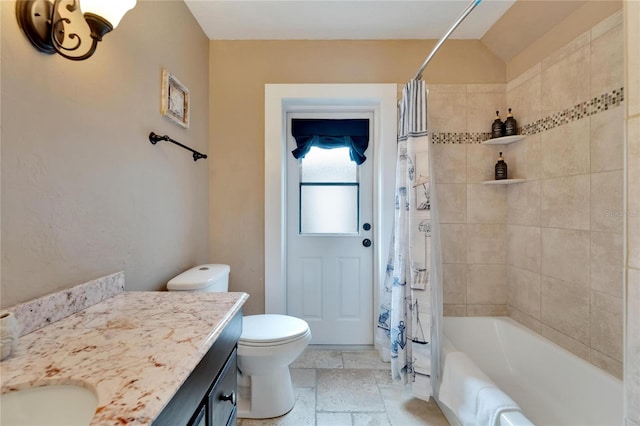 full bathroom with shower / bath combination with curtain, vanity, and toilet