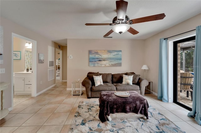 tiled living room featuring ceiling fan