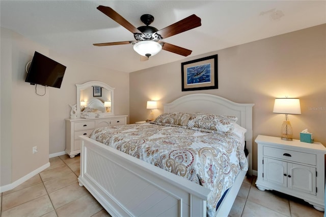 tiled bedroom with ceiling fan