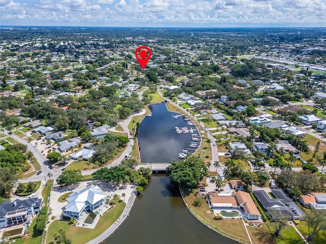 drone / aerial view with a water view