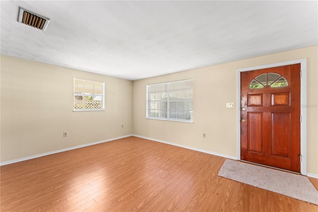 foyer featuring light hardwood / wood-style floors