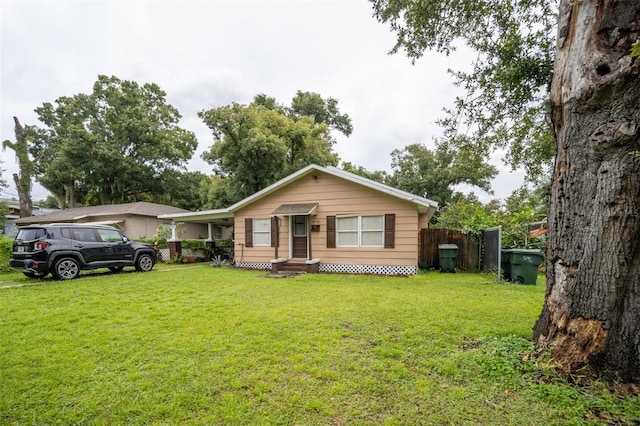 view of front facade with a front yard