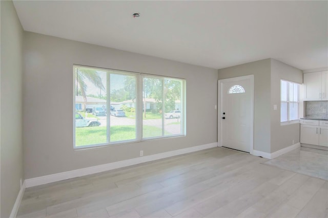 interior space with light hardwood / wood-style floors