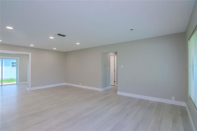 empty room with light wood-type flooring