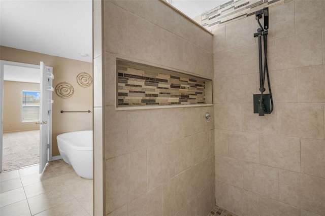 bathroom featuring tile patterned floors and separate shower and tub