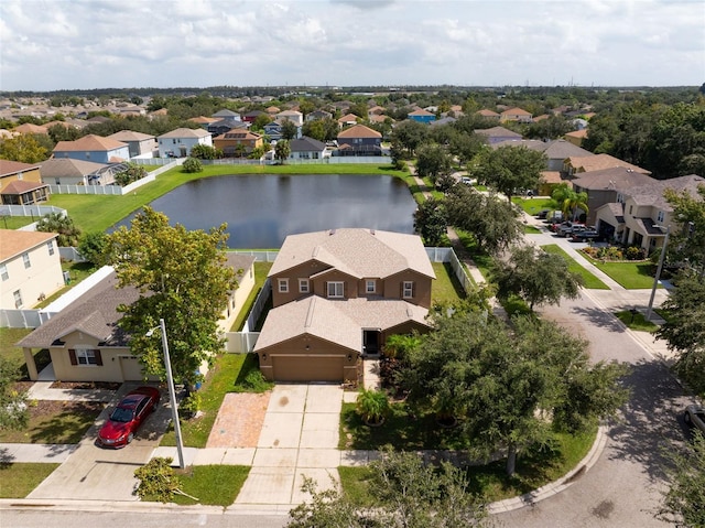 drone / aerial view with a water view