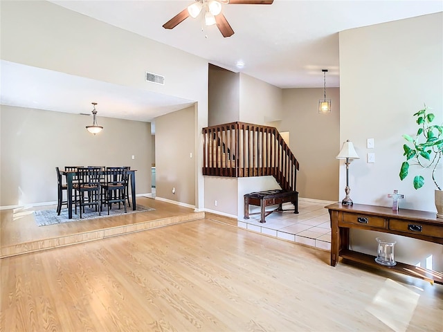 interior space featuring ceiling fan and light hardwood / wood-style flooring