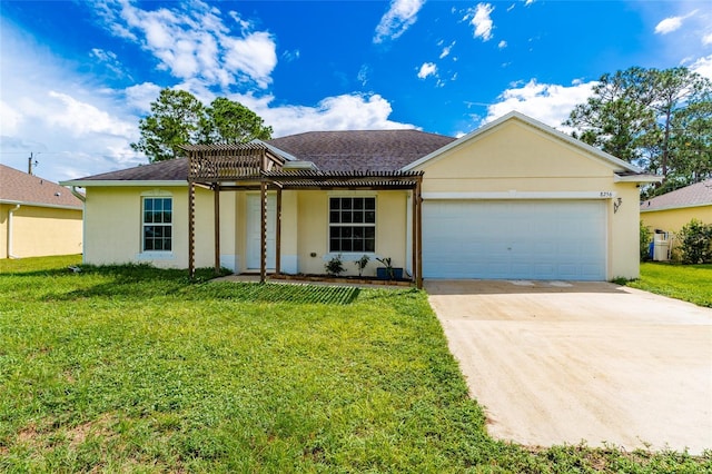 ranch-style house featuring a garage and a front yard