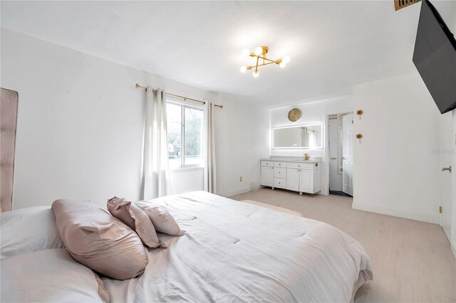 bedroom with light hardwood / wood-style floors