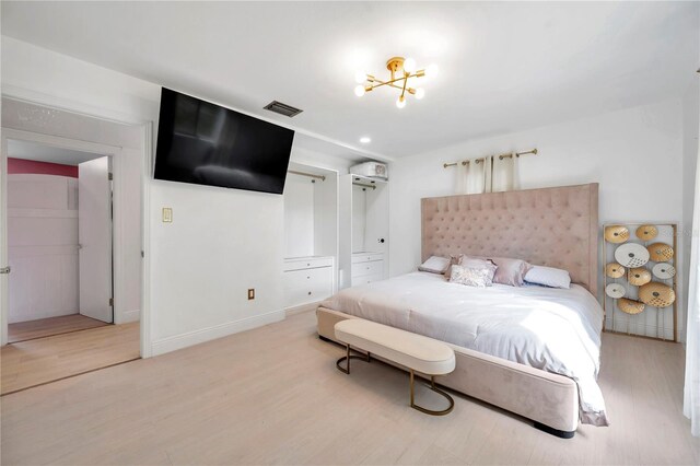 bedroom featuring light wood-type flooring