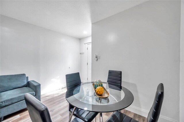 dining room with light wood-type flooring