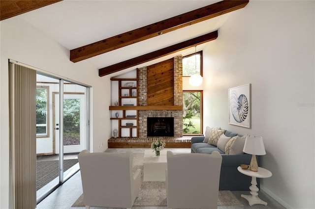 living room with a fireplace and lofted ceiling with beams