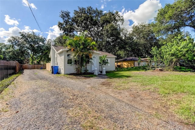 exterior space with a front lawn