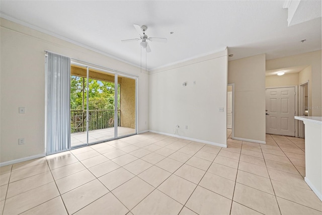 tiled spare room with ceiling fan and crown molding