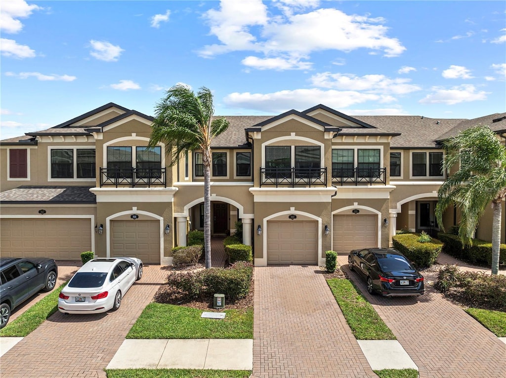 view of front of home with a balcony