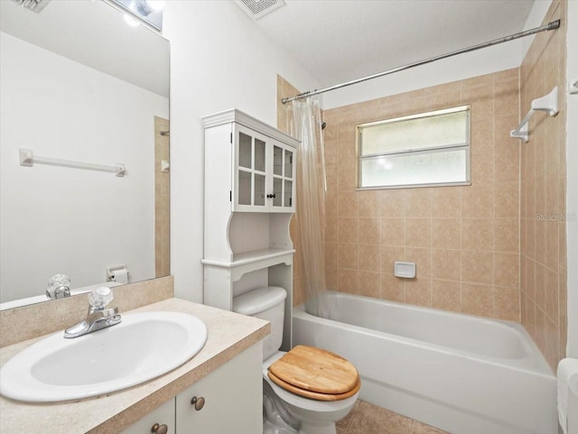 full bathroom with shower / tub combo, vanity, and toilet