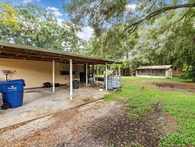 view of yard with a storage shed