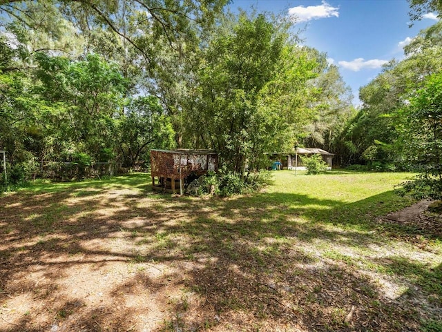 view of yard featuring a deck