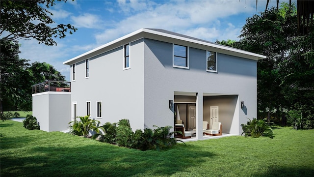 back of house featuring a yard and a patio area