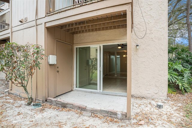 entrance to property with a balcony