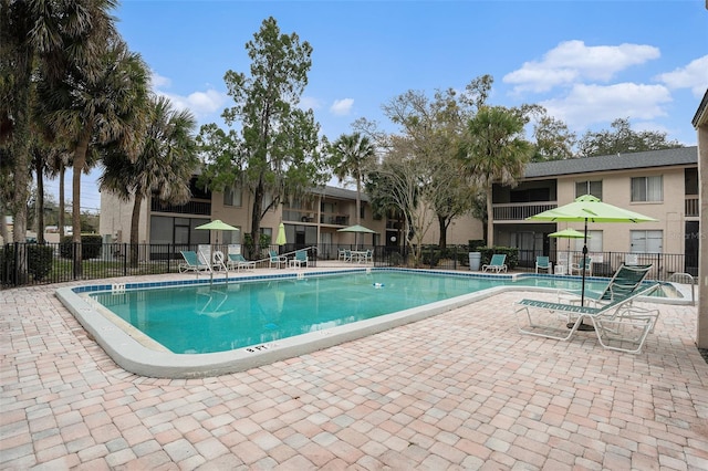 view of pool featuring a patio