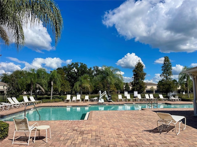 view of swimming pool featuring a patio