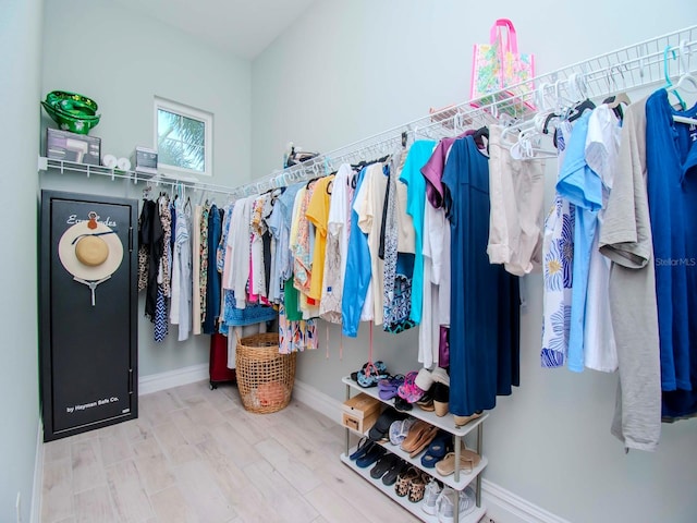 walk in closet featuring hardwood / wood-style flooring