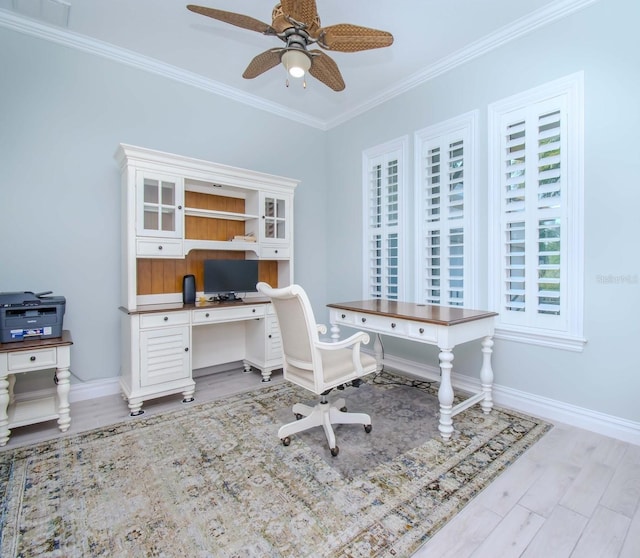 office area with light wood-type flooring, crown molding, and ceiling fan