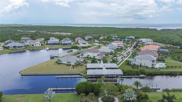 drone / aerial view with a water view