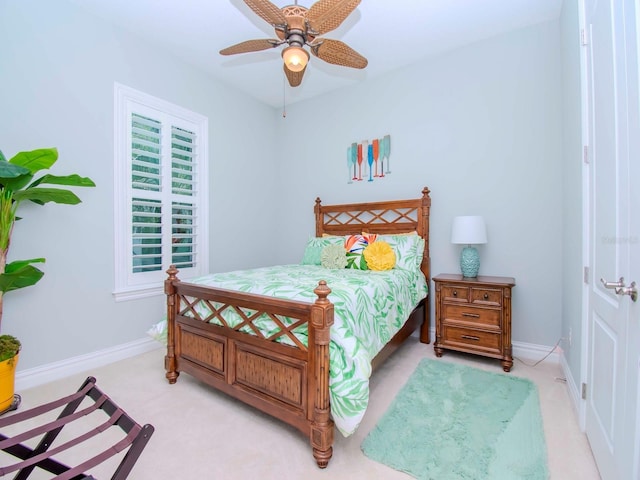 717 Manns Harbor Dr, Apollo Beach, FL 33572 - bedroom featuring light colored carpet, baseboards, and a ceiling fan