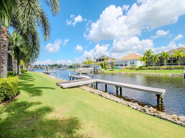 717 Manns Harbor Dr, Apollo Beach, FL 33572 - view of dock with a residential view and a water view
