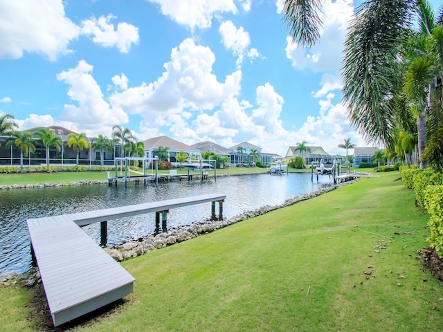 717 Manns Harbor Dr, Apollo Beach, FL 33572 - dock area with a lawn, a water view, and a residential view