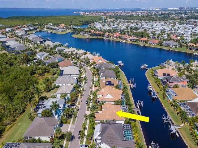 717 Manns Harbor Dr, Apollo Beach, FL 33572 - drone / aerial view with a residential view and a water view