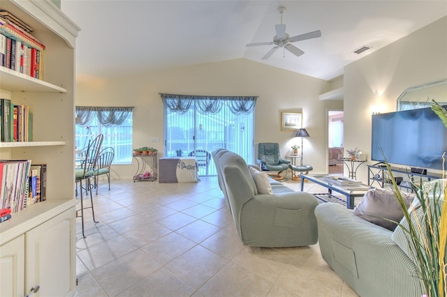 tiled living room with vaulted ceiling and ceiling fan