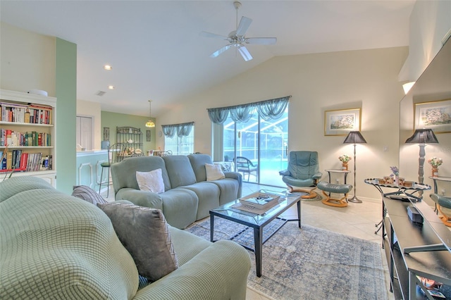 living room with vaulted ceiling, ceiling fan, and light tile patterned floors