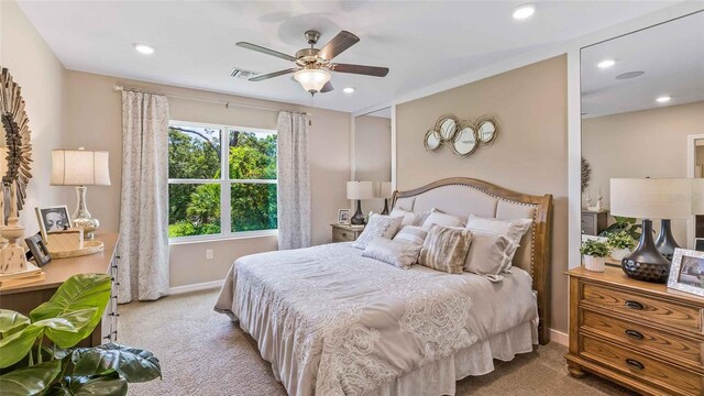 carpeted bedroom featuring ceiling fan