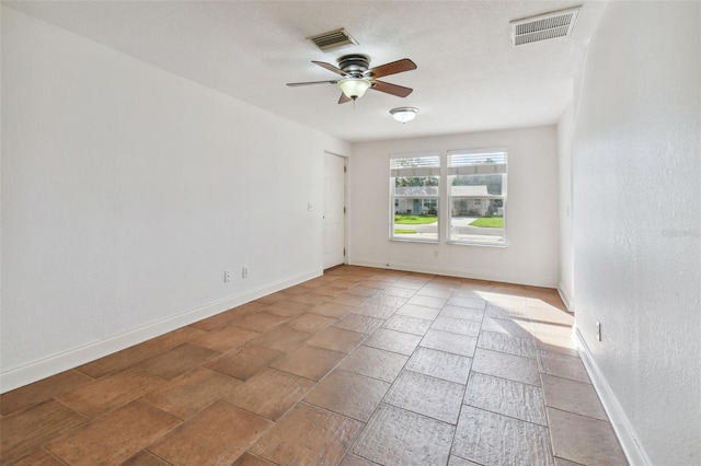 unfurnished room featuring ceiling fan