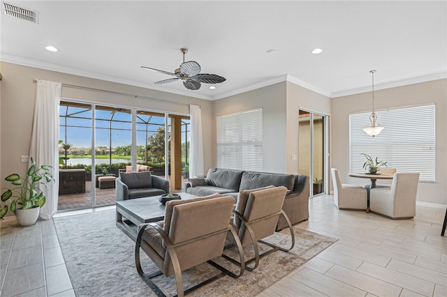 living room with ceiling fan and crown molding