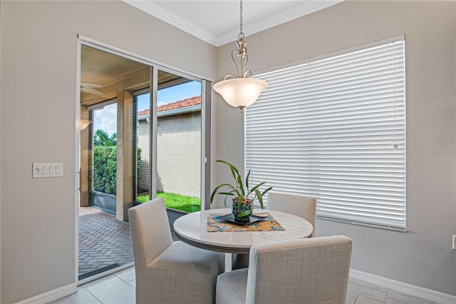 tiled dining room with ornamental molding