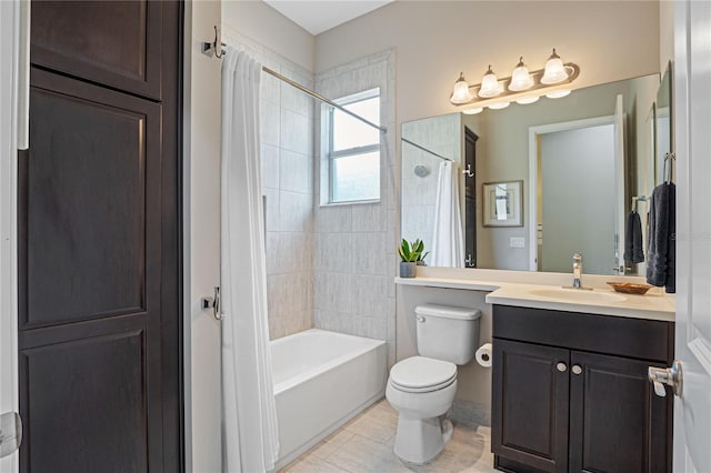 full bathroom featuring tile patterned flooring, shower / bath combination with curtain, vanity, and toilet