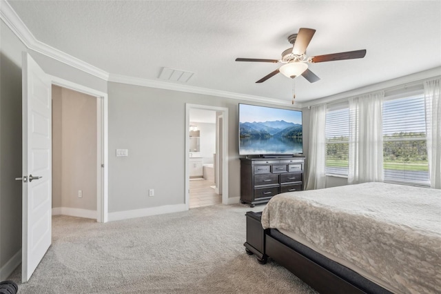 carpeted bedroom with a textured ceiling, ceiling fan, ensuite bathroom, and crown molding