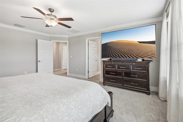 bedroom featuring ornamental molding, ceiling fan, and light carpet