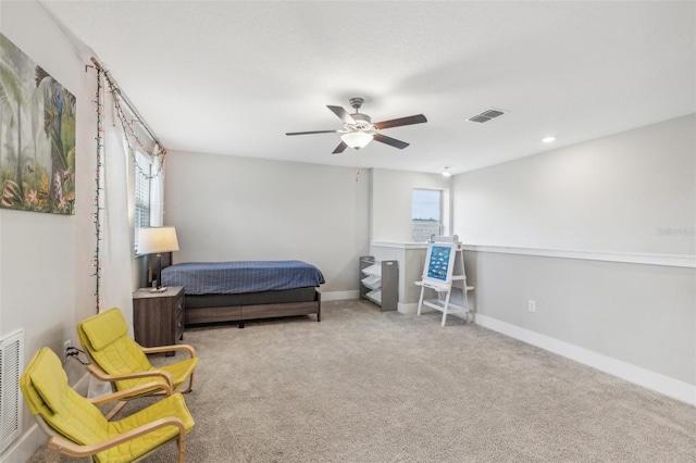 carpeted bedroom with ceiling fan